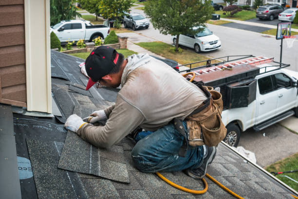 Professional Gutter Repair And Installation technician working in Polk City, FL